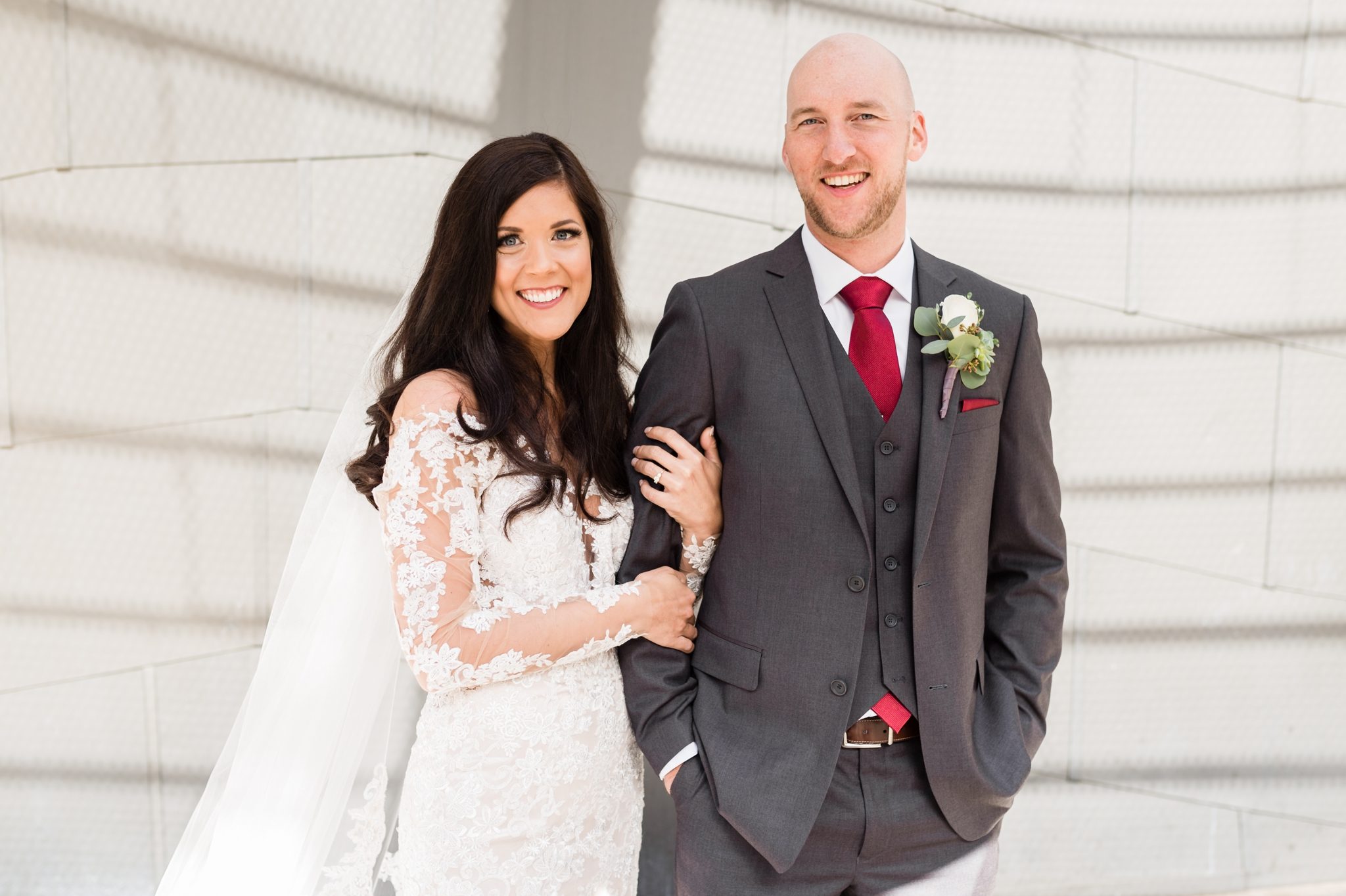 modern bride and groom portraits in st. louis, bride and groom smiling
