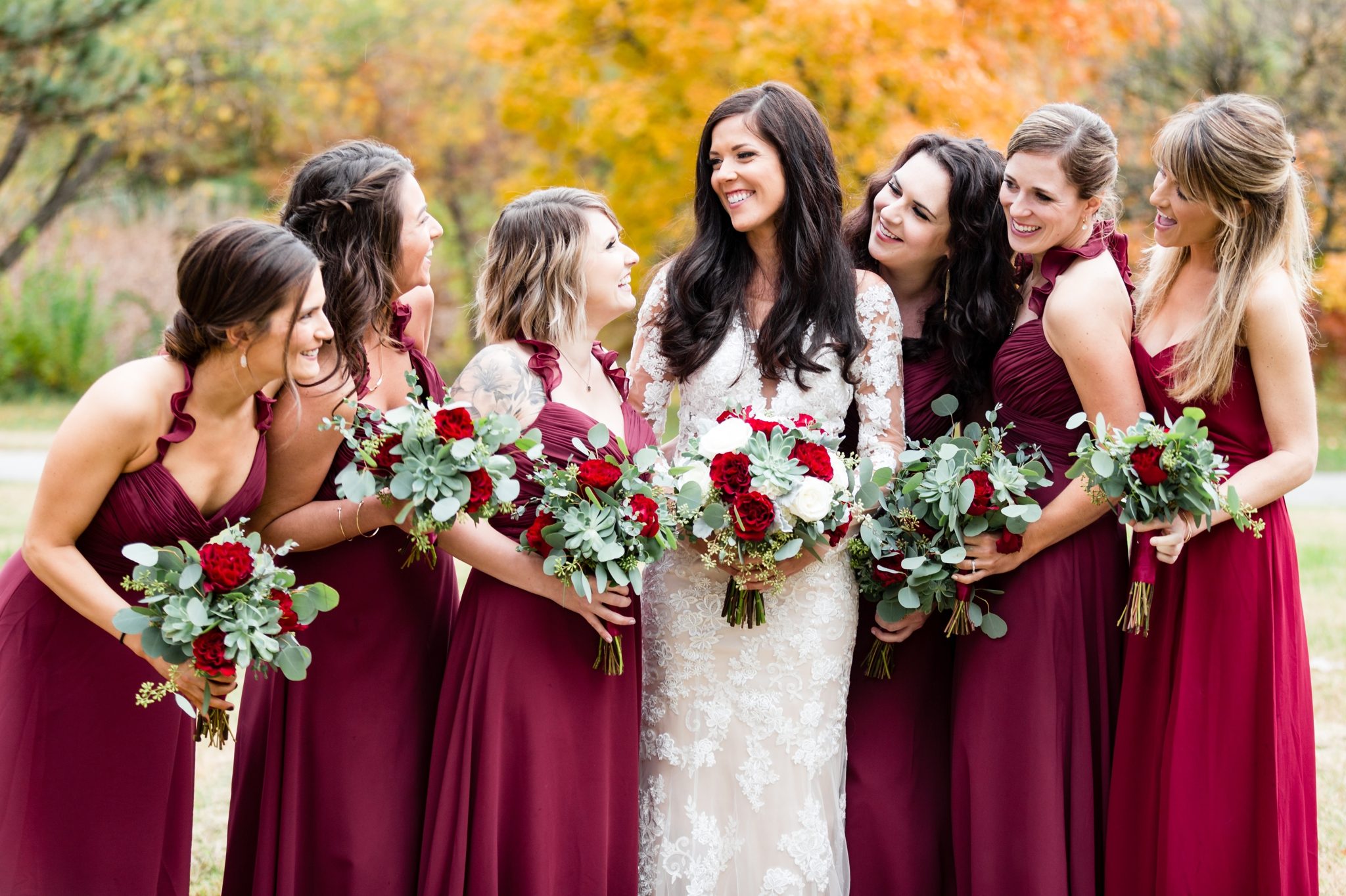 bridesmaids in burgandy dresses, succulent florals